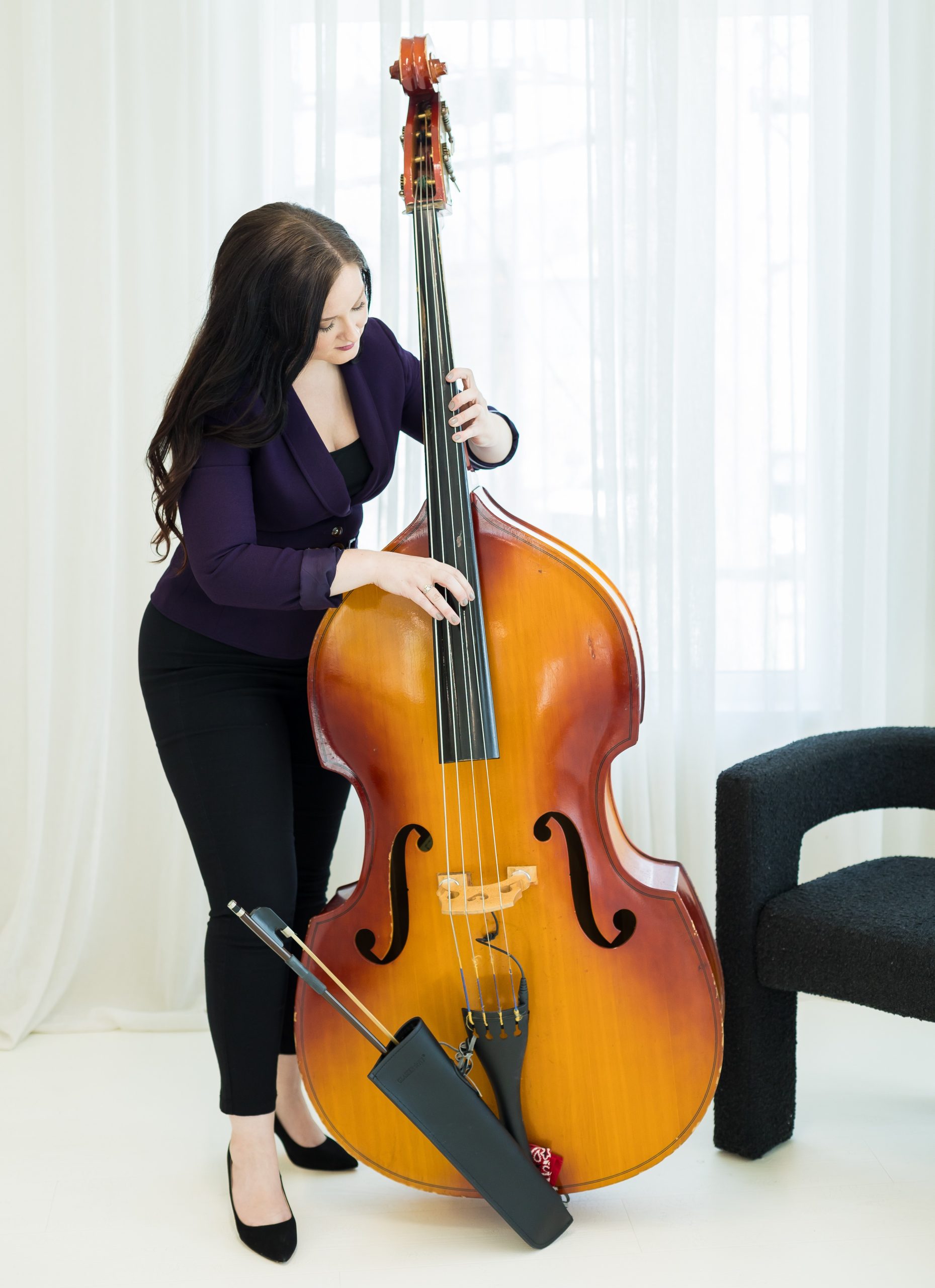 JG playing upright bass {{brizy_dc_image_alt imageSrc=
